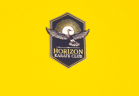 Thermisch hechtend geborduurd embleem voor de Karateclub Horizon.