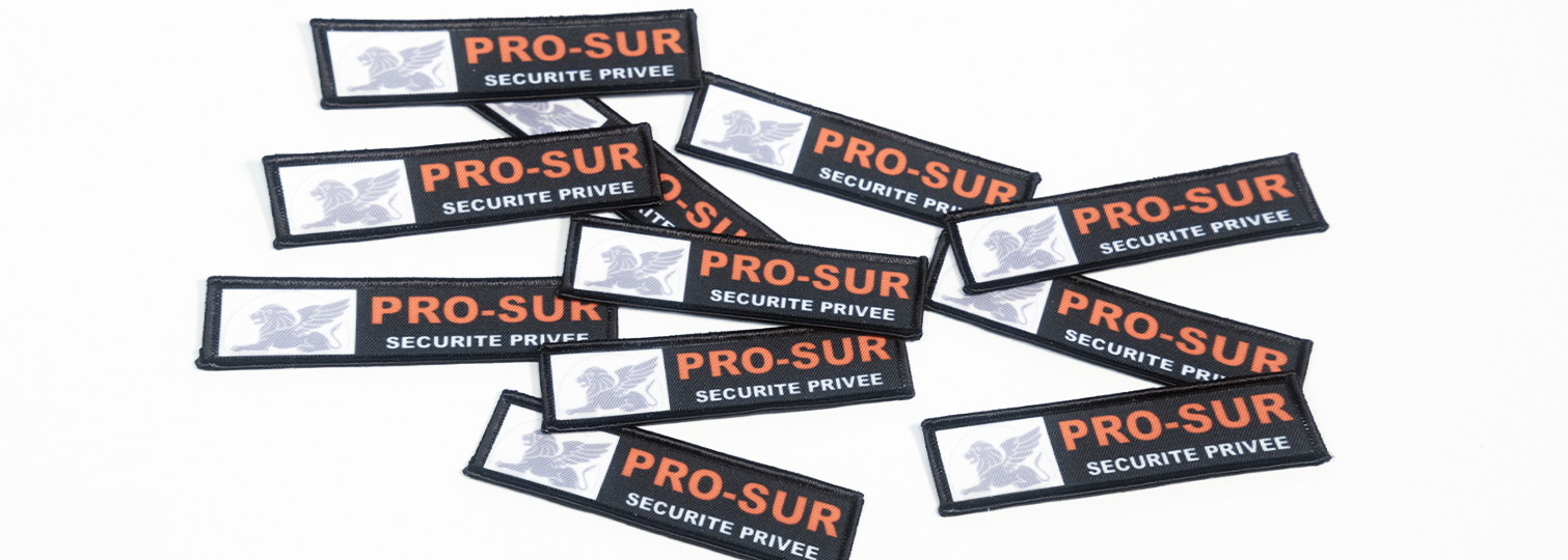 Combinatie van sublimatie-emblemen voor de beveiligingsagenten van Pro-Sur Sécurité Privée.